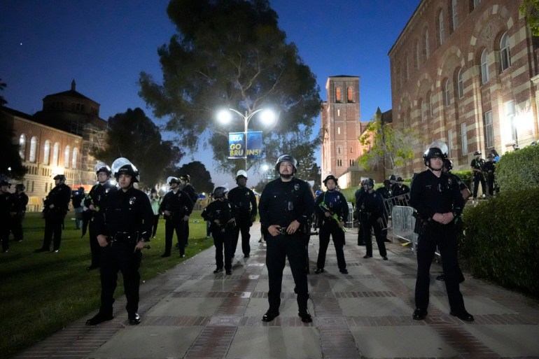 Police stage on the UCLA campus near an encampment set up by pro-Palestinian demonstrators Wednesday, May 1, 2024, in Los Angeles