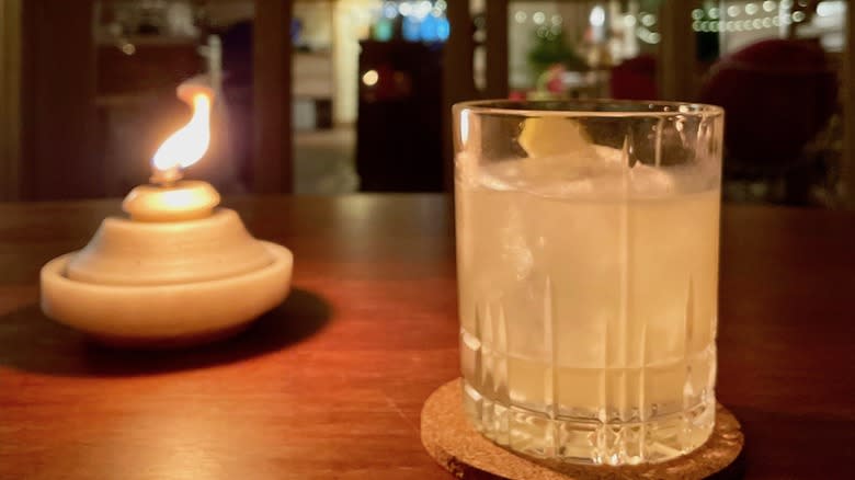 cocktail next to candle